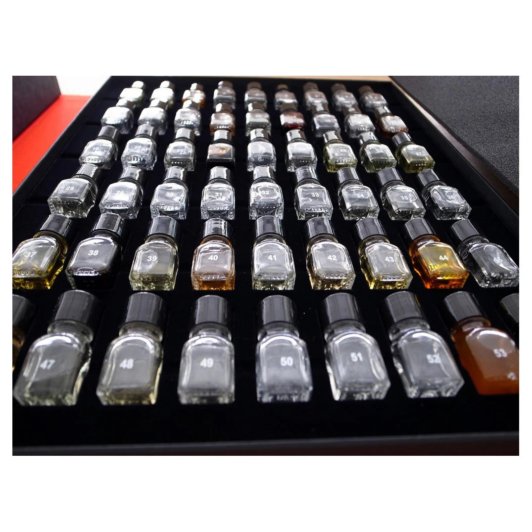 Cartas explicativas e guia do conjunto Le Nez du Vin para identificar aromas frutados, florais e especiados.